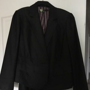 Two-piece denim navy skirt suit.